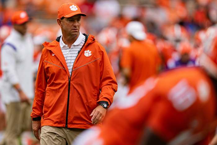 Clemson Tigers head coach Dabo Swinney looks on during warm ups before an NCAA college football game against the Furman Paladins in Clemson, S.C., Saturday, Sept. 10, 2022. (AP Photo/Jacob Kupferman)